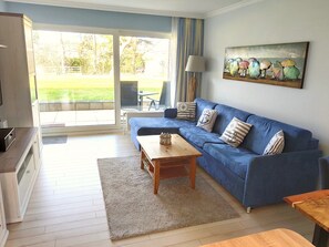 TV - Holiday Apartment "Villa Anna ll 73" with Wi-Fi, Garden & Terrace (Sankt Peter Ording)