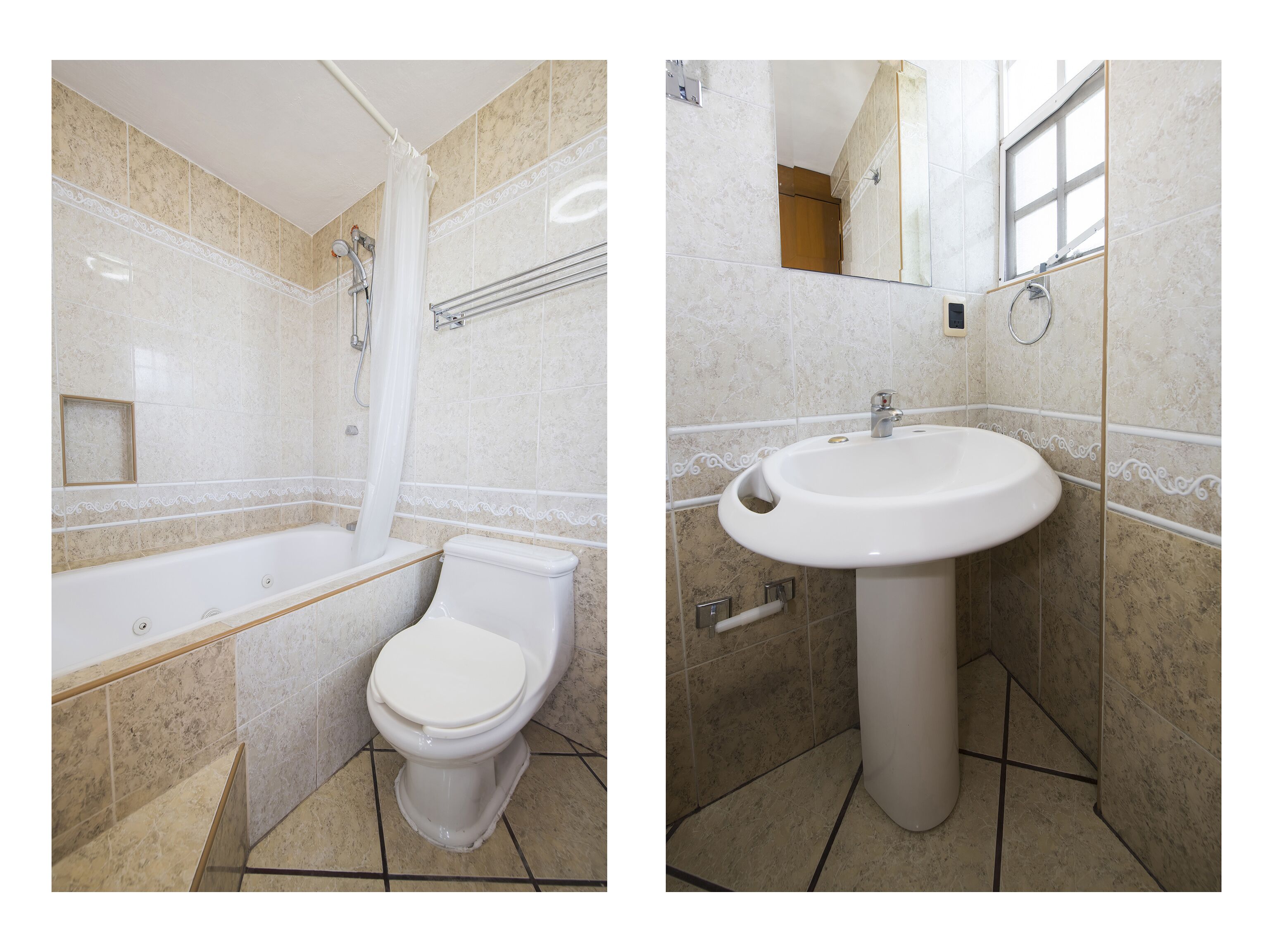 A bathroom with a bathtub, toilet, and sink.