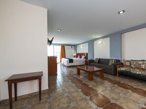 Junior Suite | Living area | 21-inch TV with satellite channels