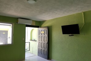 Superior Room | Living area | 32-inch TV with cable channels