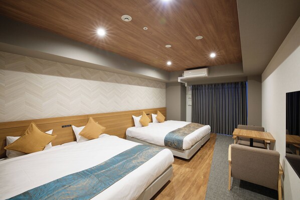 Deluxe Twin kamer, niet-roken | Luxe beddengoed, donsdekens, bedden met traagschuimmatrassen, een bureau