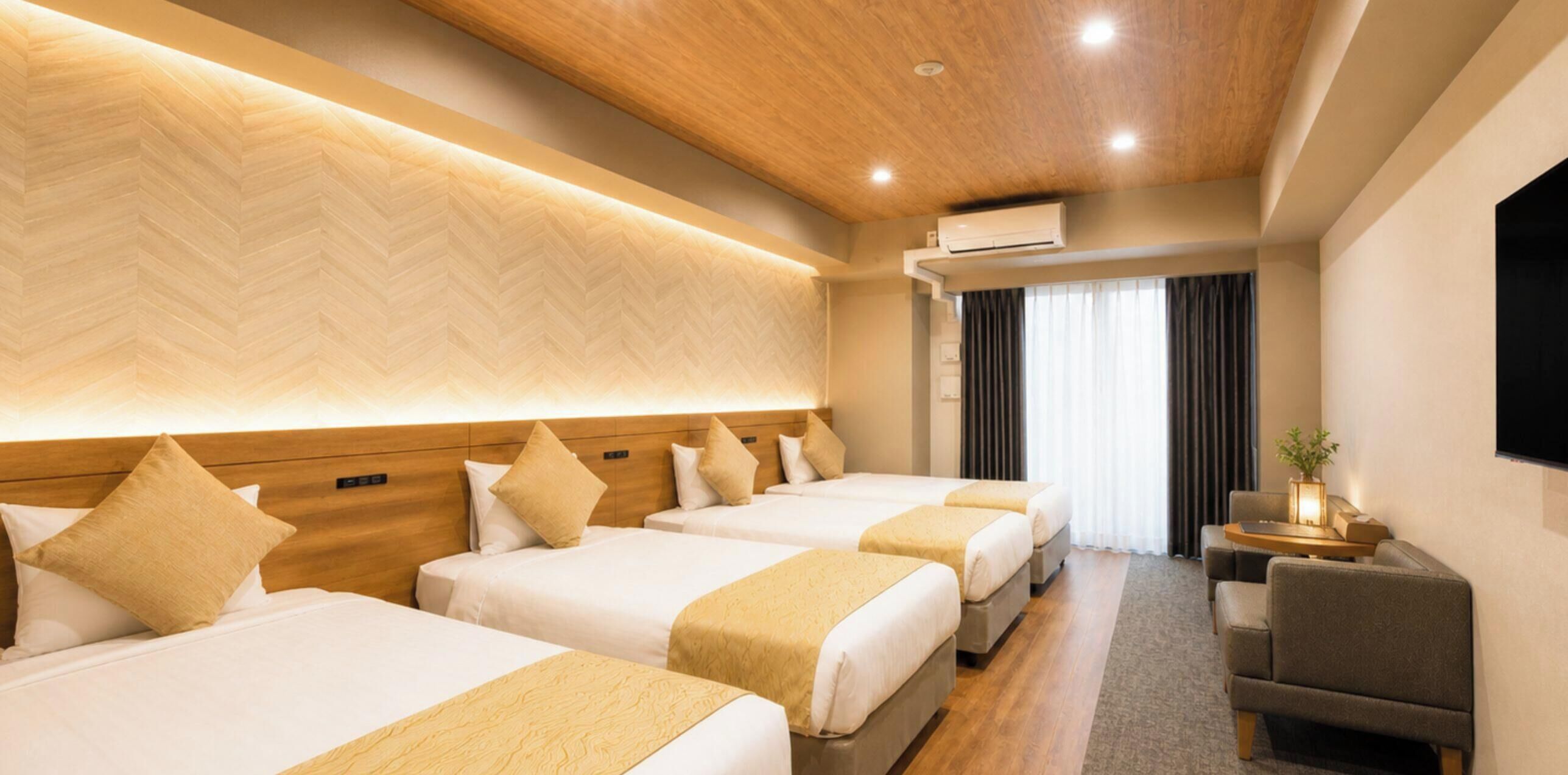 Family Quadruple Room, Non Smoking | Premium bedding, down duvets, memory-foam beds, desk