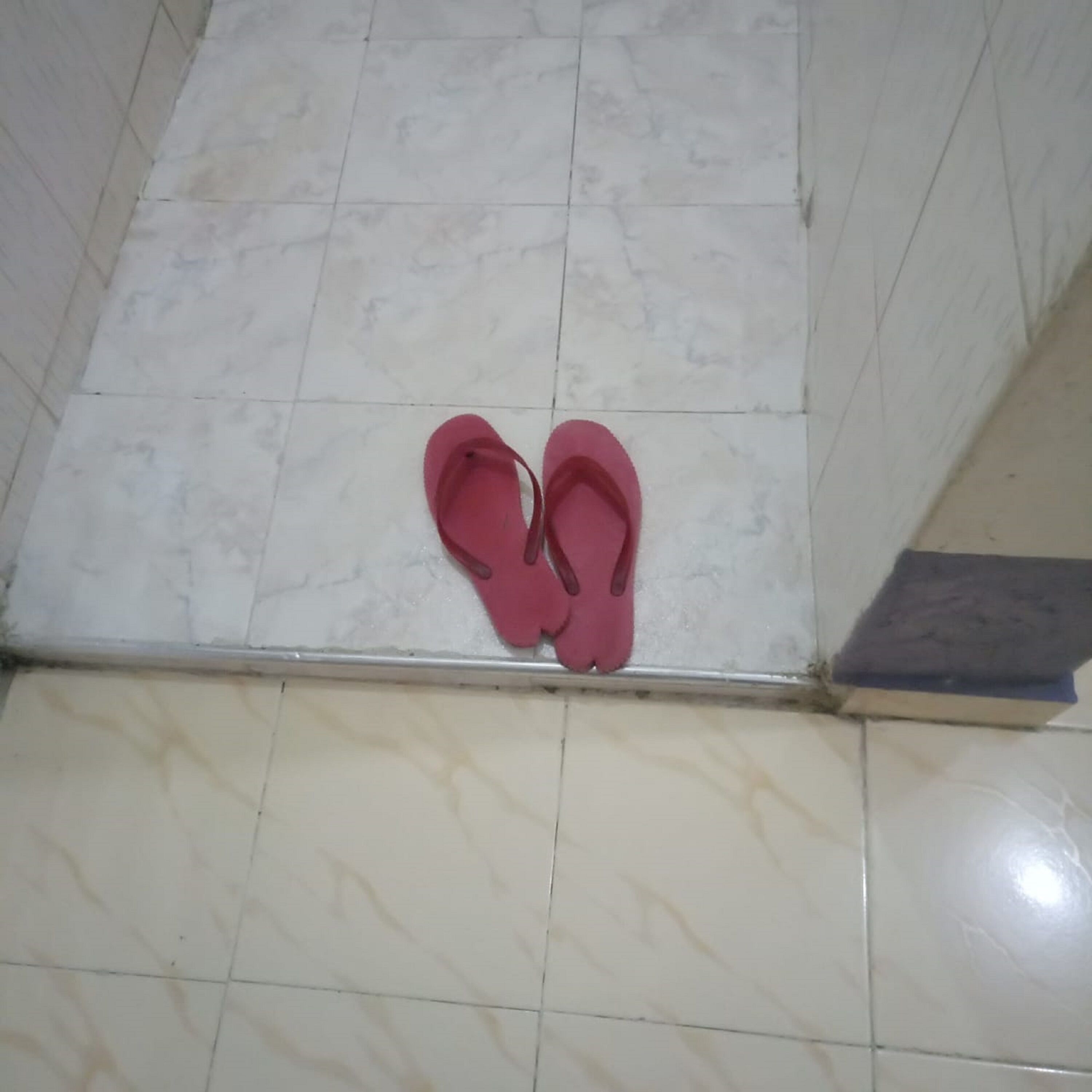 Shower, rainfall showerhead, slippers, towels