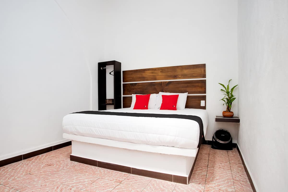Habitación superior | 1 habitación y ropa de cama