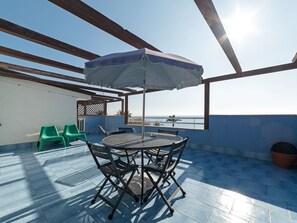 Apartment | Dining - Belvilla by OYO Apartment in Policastro Bussentino (Santa Marina)