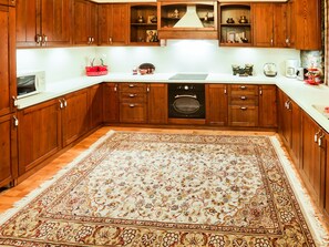 Villa | Private kitchen | Fridge, oven, stovetop, dishwasher
