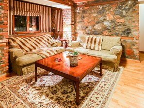 Villa | Living room | Fireplace, DVD player