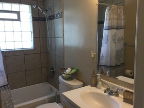 Combined shower/bathtub, hair dryer, towels, soap - Your Home Away from Home - Extended Stay Discounts! (Dayton)