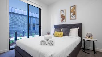 2 bedrooms, laptop workspace, iron/ironing board, bed sheets