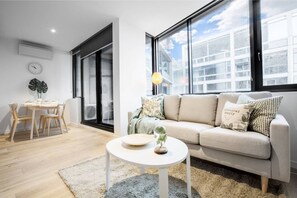 Apartment (1 Bedroom) | Living area | TV