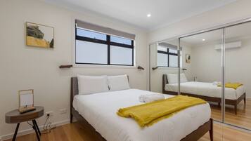 2 bedrooms, hypo-allergenic bedding, iron/ironing board, bed sheets