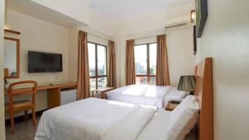 Family Triple Room | Desk, iron/ironing board, free WiFi, bed sheets