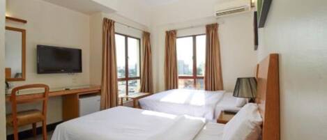 Family Triple Room | Desk, iron/ironing board, free WiFi, bed sheets