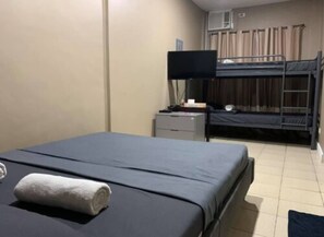 Family Room | Desk, laptop workspace, free WiFi, bed sheets - One Terence Residences Pasay near MOA (Pasay)