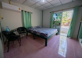 Desk, laptop workspace, bed sheets