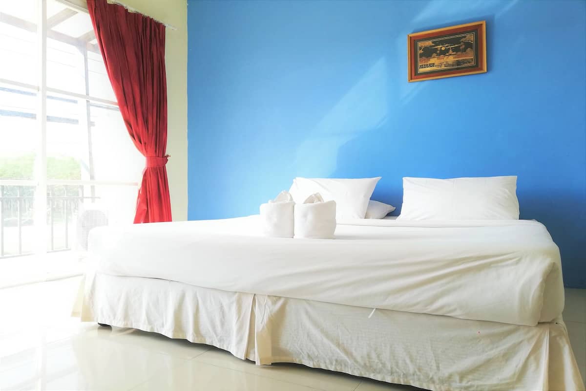 Habitación Deluxe | Caja fuerte, escritorio, wifi gratis y ropa de cama