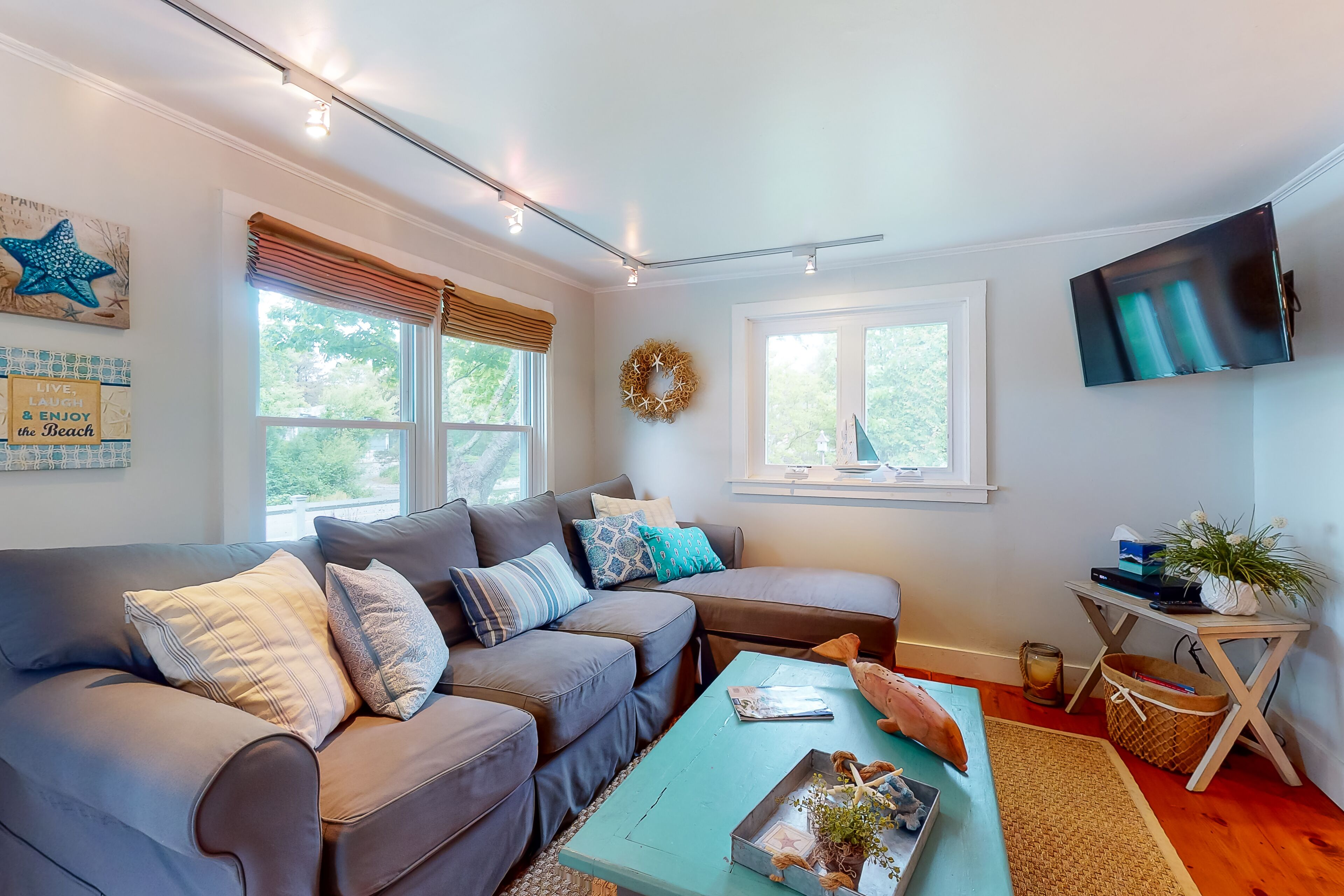 Charming home w/ a large yard, furnished patio, gas grill, & firepit