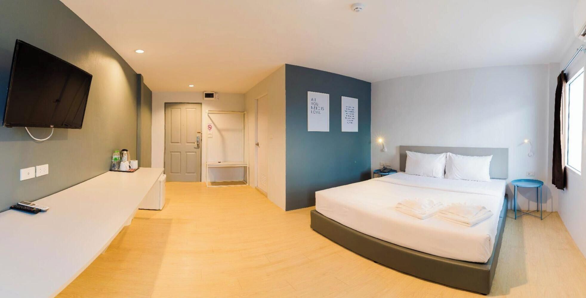 Desk, laptop workspace, free WiFi, bed sheets