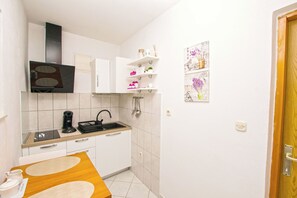 Apartment (A1) | Private kitchen | Fridge, stovetop, espresso maker, electric kettle