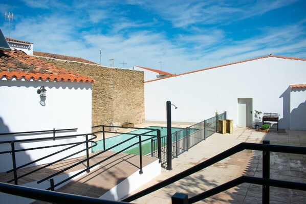 Seasonal outdoor pool, open 10:00 AM to 10:00 PM, sun loungers