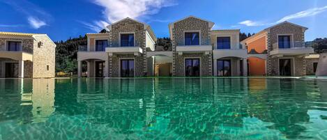 A heated pool, pool loungers