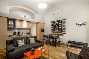Design Apartment, 1 Queen Bed | Living area | 108-cm LED TV with cable channels, TV - Patys Place (Budapest)
