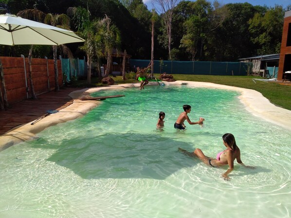 Outdoor pool, open 8:00 AM to 9:00 PM, free pool cabanas, pool umbrellas