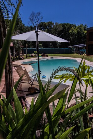 Outdoor pool, open 8:00 AM to 9:00 PM, free pool cabanas, pool umbrellas