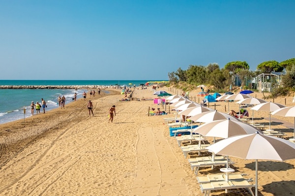 Private beach, sun loungers, beach umbrellas