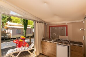 Standard Tent (Lodge-  Pet Friendly) | Private kitchen | Fridge, stovetop, cookware/dishes/utensils - Club Del Sole Spina Family Collection (Comacchio)