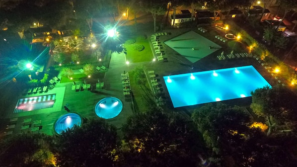Seasonal outdoor pool, pool umbrellas, pool loungers