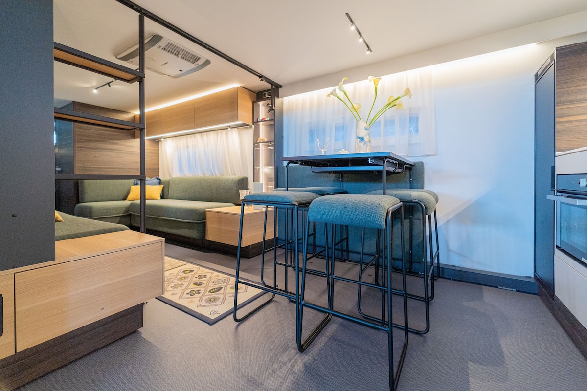 Luxury Mobile Home | Private kitchen | Full-sized fridge, stovetop, espresso maker, high chair