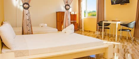 Kamar Quadruple Keluarga | 1 kamar tidur, seprai katun Mesir, seprai premium, dan brankas