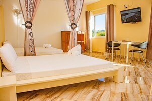 Habitación cuádruple familiar | 1 dormitorio, sábanas de algodón egipcio, ropa de cama de alta calidad