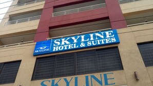 A building with a sign for 'SKYLINE HOTEL & SUITES'. - Skyline Hotel & Suites (Nakuru)