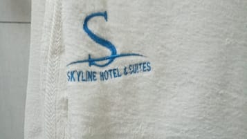 Bruser, brusehoved med spredningseffekt, hjemmesko, håndklæder