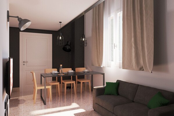 A modern living room with a dark wall, a dining table with chairs, a sofa with green cushions, and a large window with curtains.