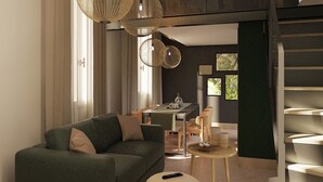 Una sala moderna con un sofá, una mesa de centro y un comedor con sillas y una mesa.