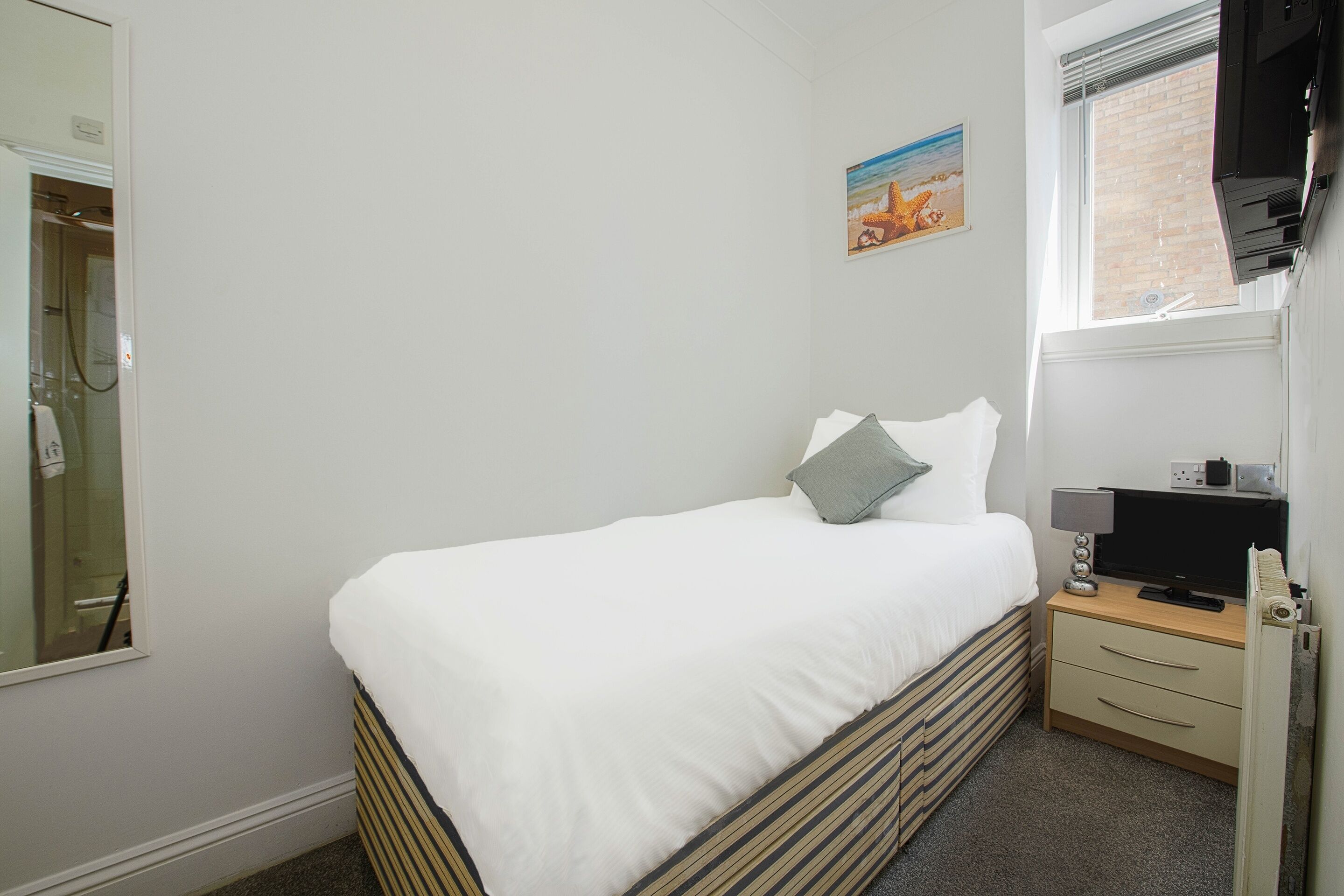 Standard Single Room | Iron/ironing board, free WiFi, bed sheets