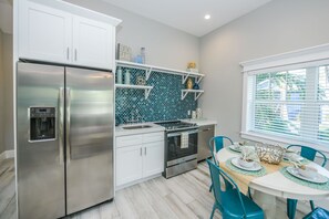 Cottage, Multiple Beds, Private Pool | Private kitchen | Fridge, microwave, stovetop, dishwasher - Indigo Tides (Holmes Beach)