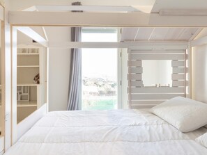 4 عدّة غرف نوم ومكواة/لوح كي وخدمة الإنترنت وملاءات أسرّة