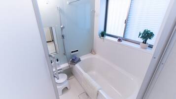 Private Vacation Home | Bathroom | Separate tub and shower, free toiletries, hair dryer, slippers