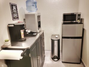 Enjoy hot beverages and quick meals in this kitchenette, equipped with a coffee maker, microwave, and refrigerator.