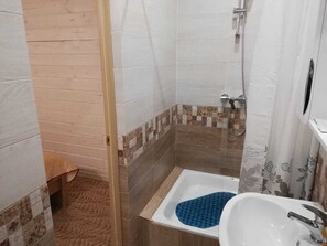 Shower, towels, soap, shampoo