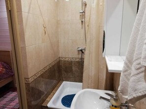 Shower, towels, soap, shampoo