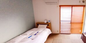 Habitación individual, para no fumadores (Free Wifi) | Caja de seguridad en la habitación, cortinas blackout y wifi gratis 