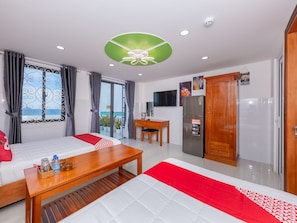 Suíte estúdio família | Frigobar, escrivaninha, Wi-Fi de cortesia, roupa de cama