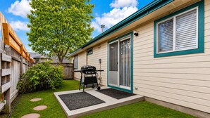 A house with a patio, a grill, and a tree. - Fenced Backyard | Near Mall & Hospitals (39) (Boise)