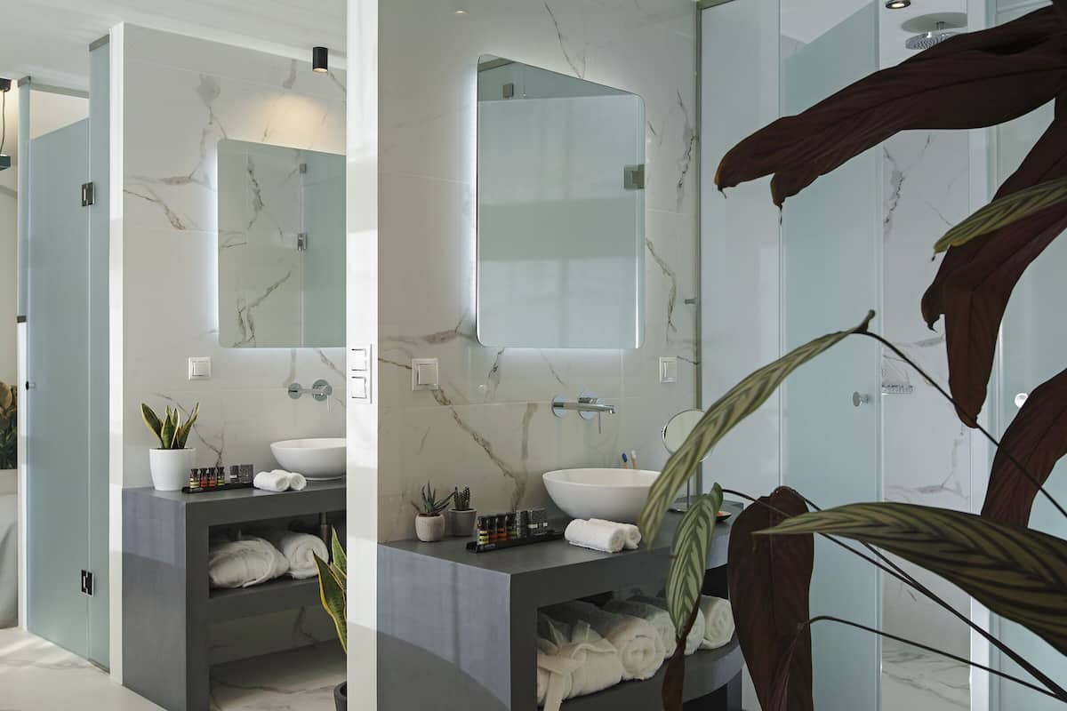 signature suite | egyptian cotton sheets, premium bedding, down duvets, minibar