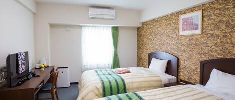 Twin Room (1 person only), Non Smoking | Blackout drapes, iron/ironing board, free WiFi, bed sheets
